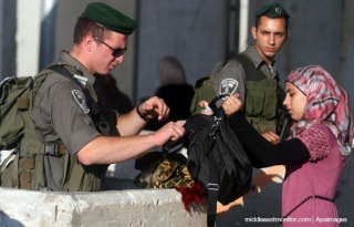 Israeli-soldiers-checkpoint-palestinian-girl.jpg