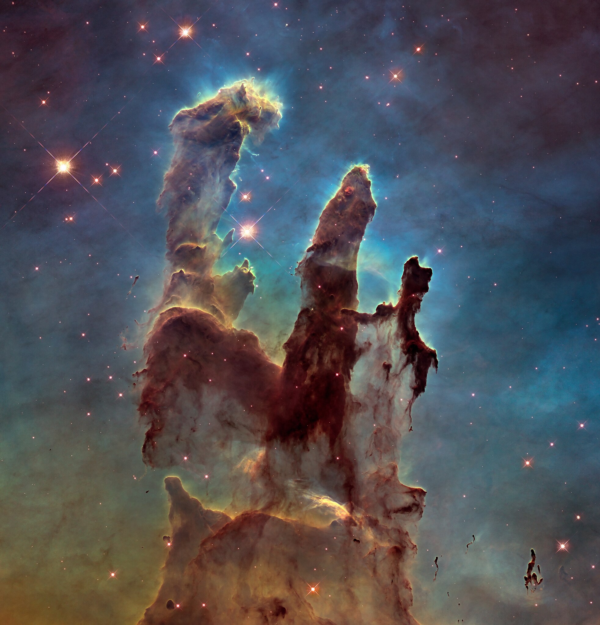 «Столпы творения» — структуры из газа и звёздной пыли зафиксированные телескопом в созвездии Орла